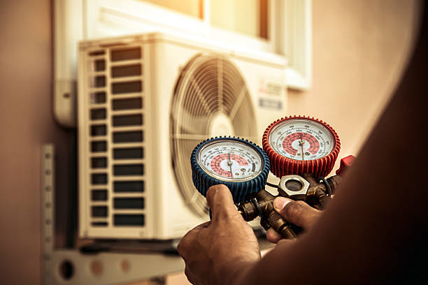 Professional Hvac technician working in Milroy, IN